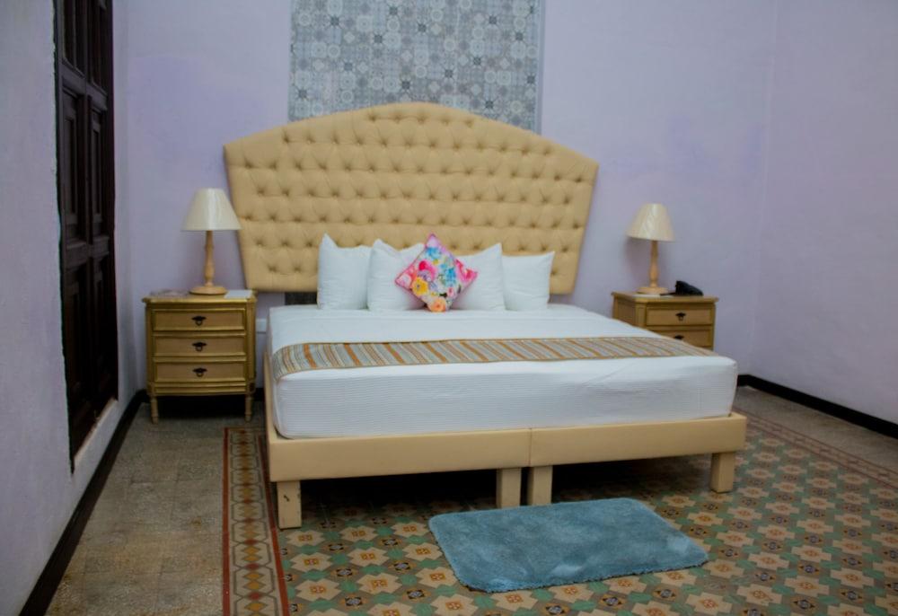 Hotel Lavanda Cas Mérida Exterior foto A bedroom at the hotel